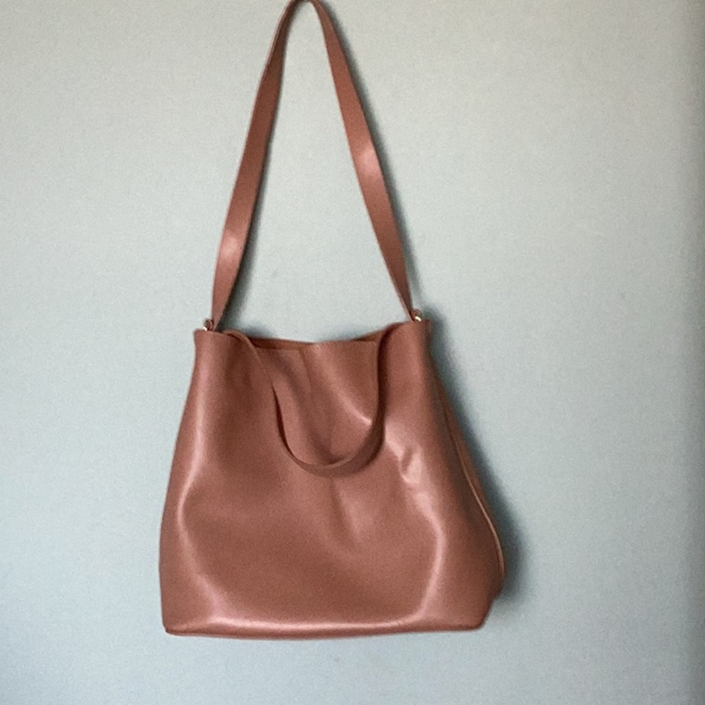 Faux leather tot bag.